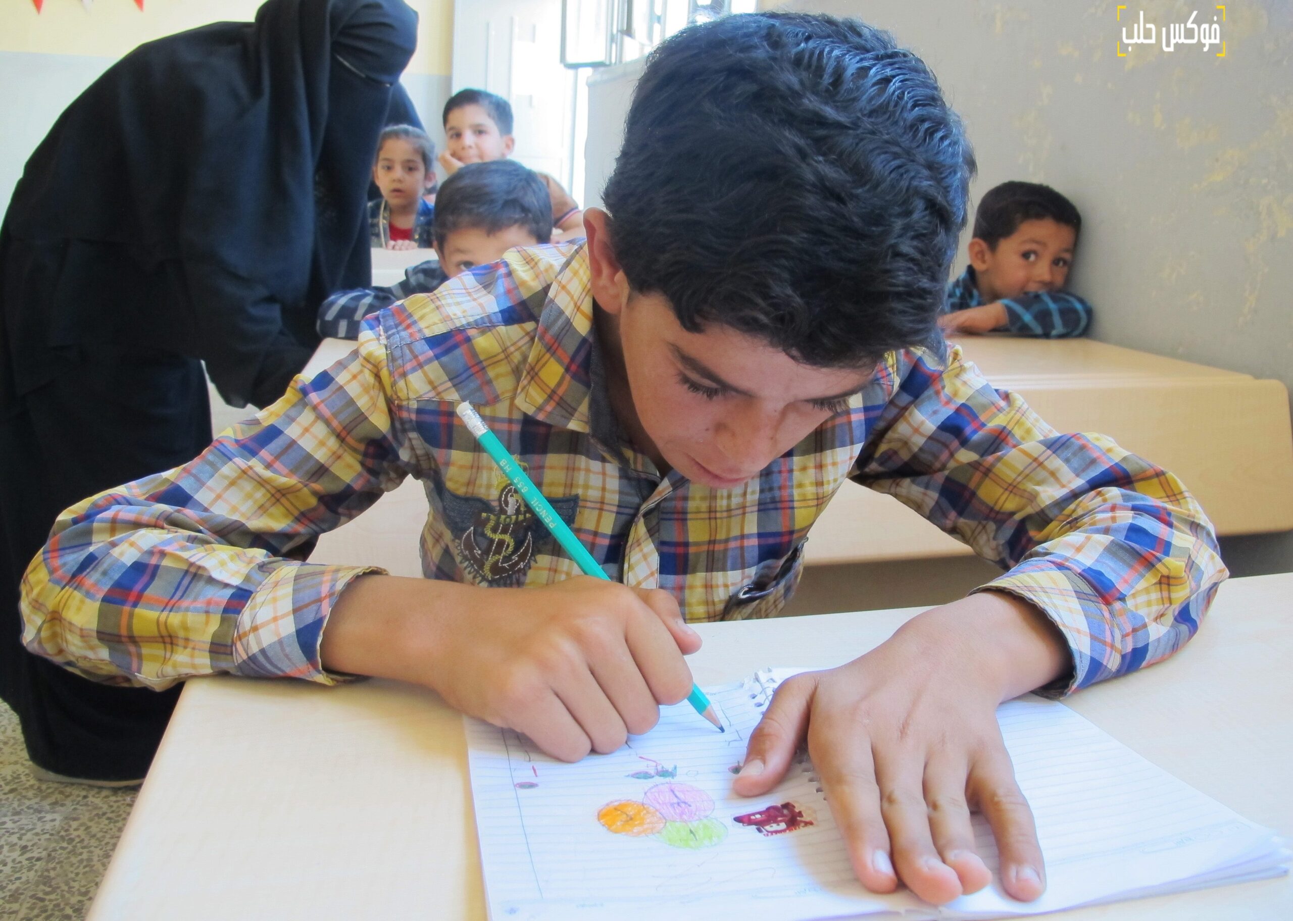 حصة الرسم في مركز الصم والبكم في مدينة الباب بريف حلب.