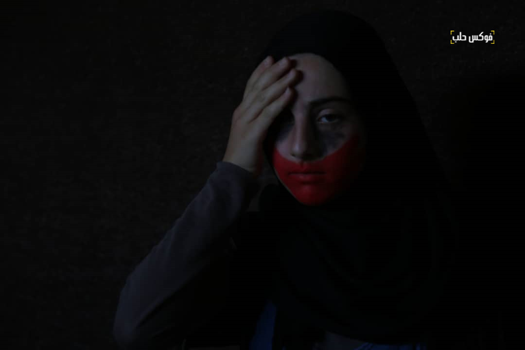 مشهد تمثيلة لإحدى المشاركات في "حملة 16 يوم".