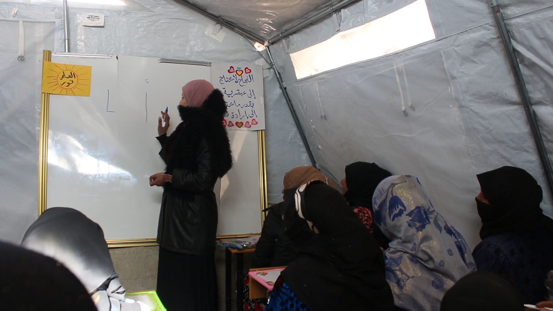 من دروس محو الأمية في مخيم بينين بريف إدلب