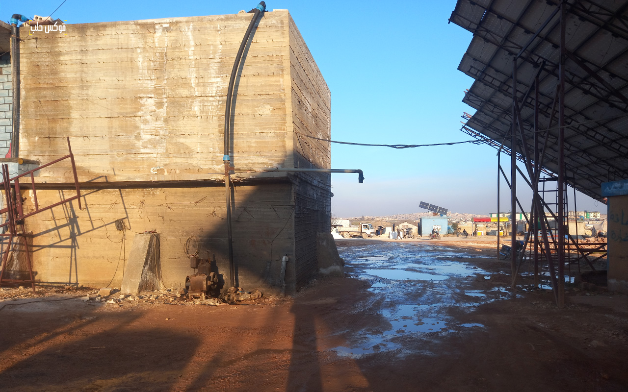 الصورة من آبار مخيمات دير حسان شمالي إدلب-تصوير: حسن كنهر الحسين